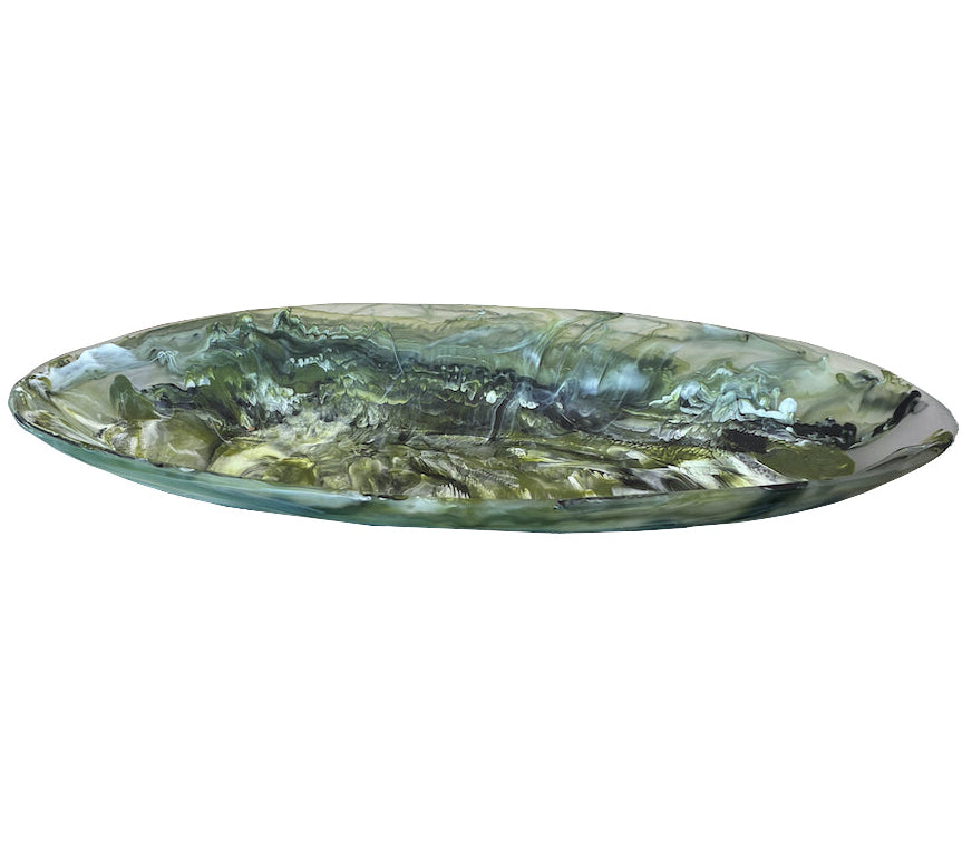 The Nashi Home Serveware Collection, Forest, features a shallow oval glass dish with a green and white marbled pattern—ideal for serving or as a striking decor accent.