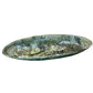 The Nashi Home Serveware Collection, Forest by Nashi Home features a green glazed ceramic oval platter with a textured, marbled surface—an elegant piece that enhances your home decor.
