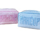 The Walker Valentine Small Milan Cosmetic Case features "MAKEUP" embroidery, comes in pink and blue, and is covered in clear plastic—ideal as a stylish beauty organizer or travel makeup case.