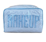 The Walker Valentine Small Milan Cosmetic Case features blue and white stripes and "MAKEUP" embroidered on the front—ideal for organizing your beauty essentials while traveling.