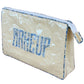 The Walker Valentine Large Helen Cosmetic Case, featuring "MAKEUP" in bold blue on a light yellow and white striped design, is a roomy rectangular zippered bag—ideal for organizing cosmetics at home or while traveling.
