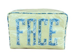 The Walker Valentine Large Milan Cosmetic Case, "FACE," is a rectangular zippered organizer with yellow stripes and bold blue floral letters—ideal as a stylish travel makeup bag.