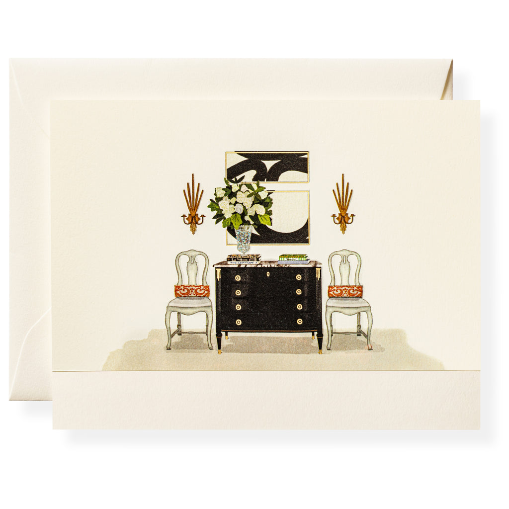 The Dolce Vita Card Set by Karen Adams features hand-embellished cards with a black chest, floral motifs, chairs, sconces, and abstract art on a cream background—an ideal and unique hostess gift.