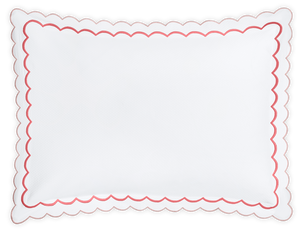 The Matouk India Pique Bedding Collection in Blush features a white rectangular pillow with a diamond pique texture, scalloped edges, and an elegant red border, crafted from a soft cotton blend.