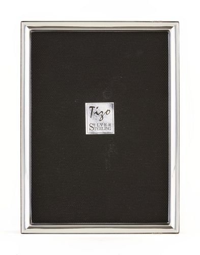 The Sterling Narrow Beveled Frame Collection by Tizo Design features timeless elegance with tarnish resistance, perfect for showcasing your cherished memories in style.