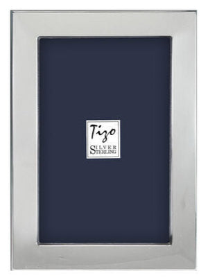 A rectangular frame from the Flat Plain Sterling Silver Frame Collection by Tizo Design features a dark blue placeholder labeled "Tizo Silver Sterling" in the center, blending timeless sophistication with minimalist design.