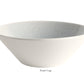 The Vuelta White Pearl Collection by Jars features a plain white ceramic bowl with a wide rim, narrow base, elegant perle glaze, and "Fruit Cup" labeled underneath.