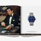 A book by Assouline titled "James Bond Style" showcases a man in a tuxedo at a card table on the left page, capturing the essence of James Bond, while a blue-faced wristwatch adorns the right page, representing timeless fashion.