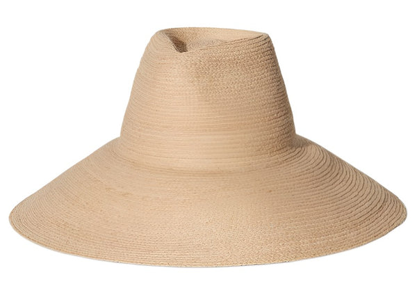 A wide-brimmed Janessa Leone Tinsley Hat isolated on a white background.