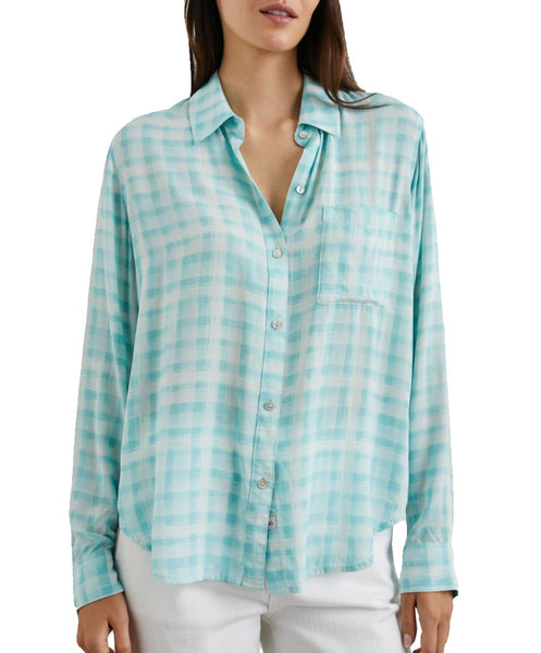 Woman wearing a turquoise and white plaid Rails Josephine Top with a collar and front buttons, paired with white pants.