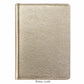 The Graphic Image 7" Leather Notebook in metallic white gold features textured leather and a closed design, shown against a white background—a perfect companion for capturing inspiration anywhere.