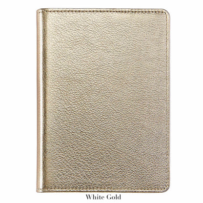 The Graphic Image 7" Leather Notebook in metallic white gold features textured leather and a closed design, shown against a white background—a perfect companion for capturing inspiration anywhere.