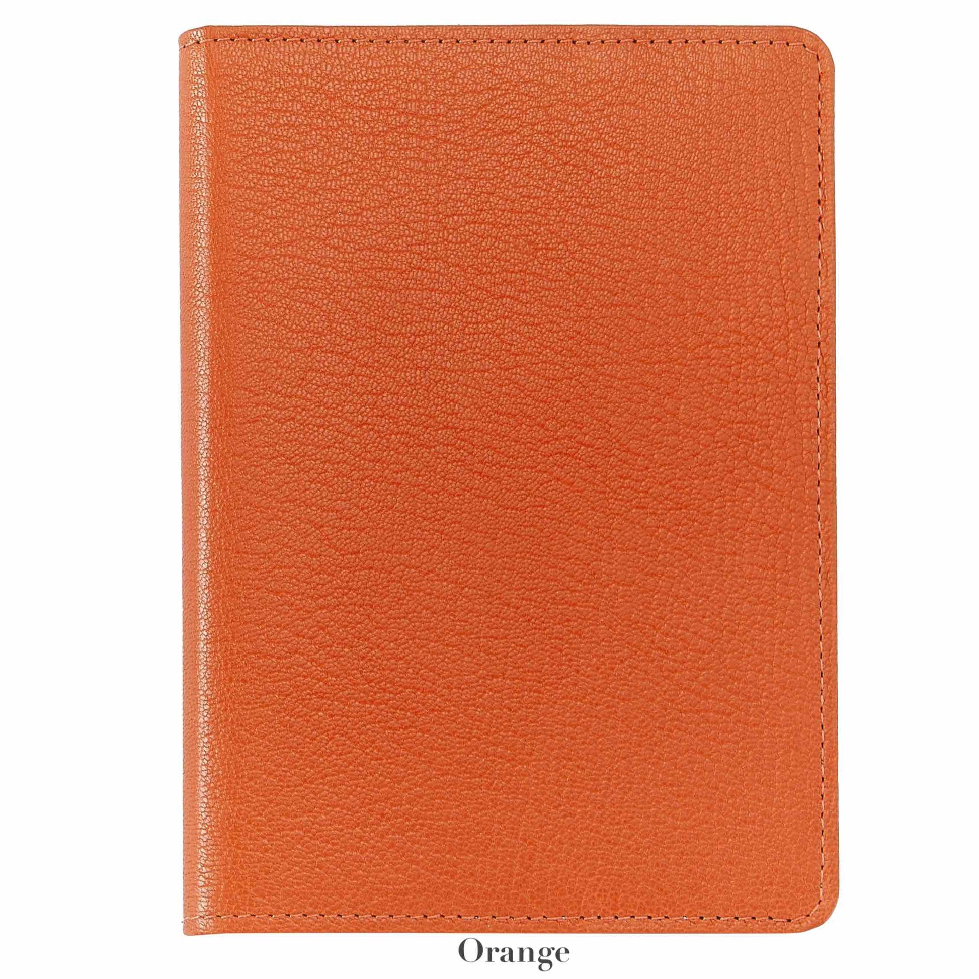 The 7" Leather Notebook by Graphic Image, featuring a closed orange textured leather cover and gold-gilded premium paper, is displayed against a white background—a perfect companion for writers.
