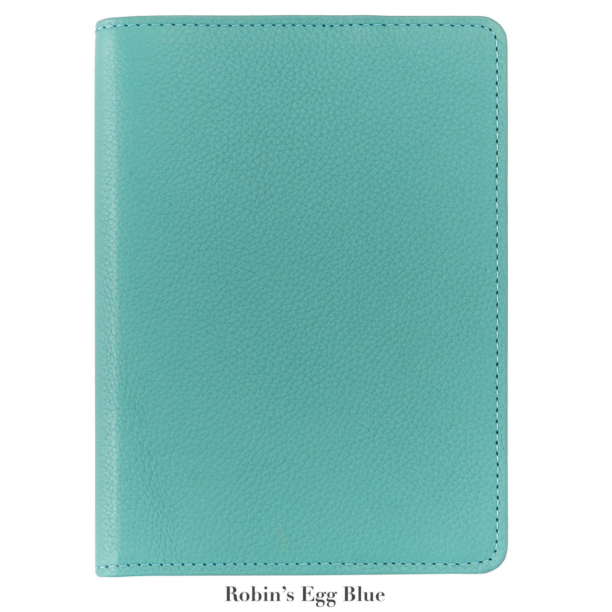 A 7" Leather Notebook by Graphic Image in robin’s egg blue, featuring a textured cover and closed design, is displayed on a white background. Below, the text reads “Robin’s Egg Blue.”.