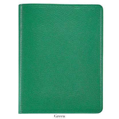 A 7" green leather notebook by Graphic Image, a perfect writer's companion, rests on a white background with the word "Green" displayed below.