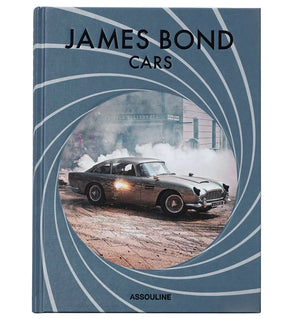 James Bond Cars" is a hardcover book from Assouline, featuring iconic spy vehicles and a cover image of a classic car driving through smoke.