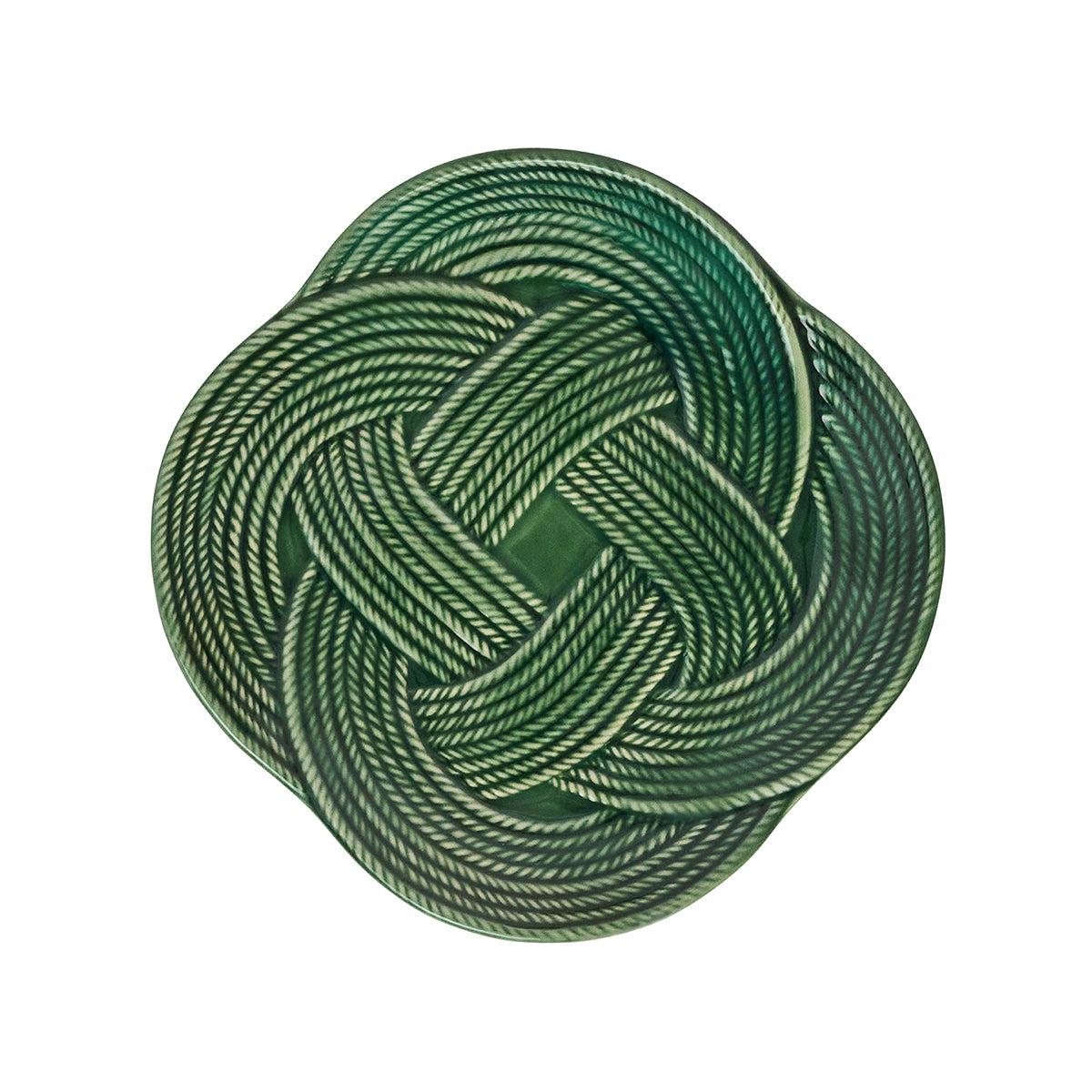 A green, intricately woven knot in a circular, symmetrical pattern on a crisp white background captures the timeless elegance of Juliska's Le Panier Mystic Knot Basil Dinnerware and Serveware Collection.