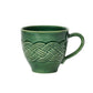 A green ceramic mug by Juliska, featuring a braided rope pattern and textured handle, inspired by the Le Panier Mystic Knot Basil Dinnerware and Serveware Collection, set against a white background.