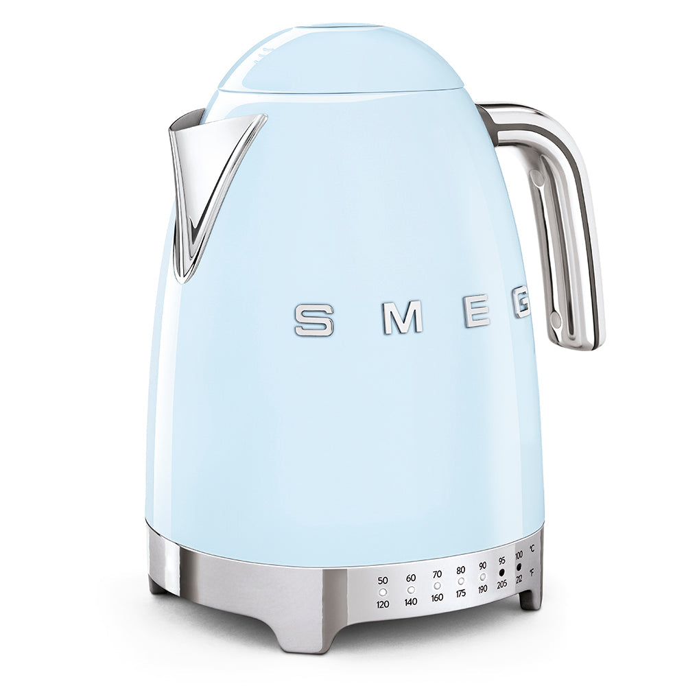 A retro-style Smeg electric kettle in light blue, featuring a chrome handle and water level indicator, comes with the brand's raised logo. Part of the SMEG Variable Temperature Kettle Collection, it includes a 360° swivel base for easy use.