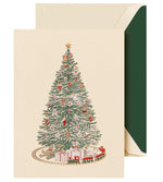 The Crane Christmas Morning Tree Card Set features a decorated tree with ornaments, gifts underneath, a toy train set, and comes with green-lined envelopes.