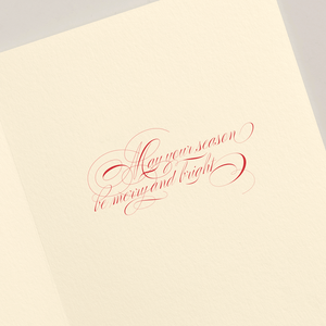The Crane Christmas Morning Tree Card Set features open greeting cards with red cursive “May your season be merry and bright” on cream paper—perfect for sharing warm wishes this holiday season.