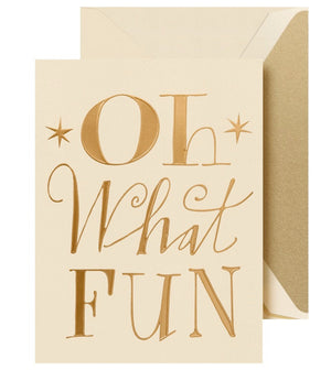 The Crane Oh What Fun Card Set features cream-colored cards with gold foil "Oh What Fun" text and matching gold envelopes—perfect for sharing holiday cheer.
