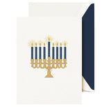 The Crane Lights of Hanukkah Card Set features a gold menorah with nine blue candles, shown with a white envelope lined in dark blue.