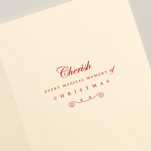 The Crane Engraved Gingerbread Cottage Card Set features cream cards with red text saying, "Cherish every magical moment of Christmas," in a decorative font—ideal for boxed card sets or pairing with scarlet lined envelopes.