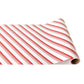 A roll of paper from the Candy Cane Collection featuring a red and white diagonal candy cane stripe pattern perfect for a festive tablescape.