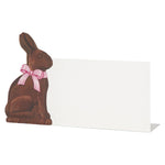 A blank white card from Hester & Cook's Hershey's Chocolate Bunny Place Setting Collection, featuring a chocolate bunny with a pink ribbon on the left—perfect for Easter celebrations.