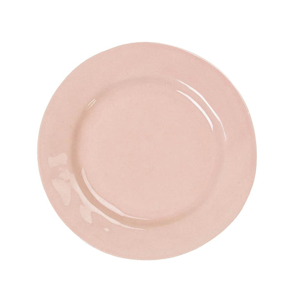 The Juliska Puro Blush Dinnerware Collection features a plain, round light pink ceramic plate in a soft blush hue—ideal for stylish table settings or adding a modern, timeless touch to your collection.