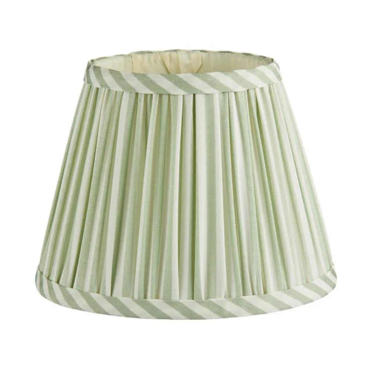 The Addison Ross Empire and Scalloped Lampshade features a pleated, cone shape with light green and white striped fabric trim on the top and bottom edges, designed for an E14 bulb holder.