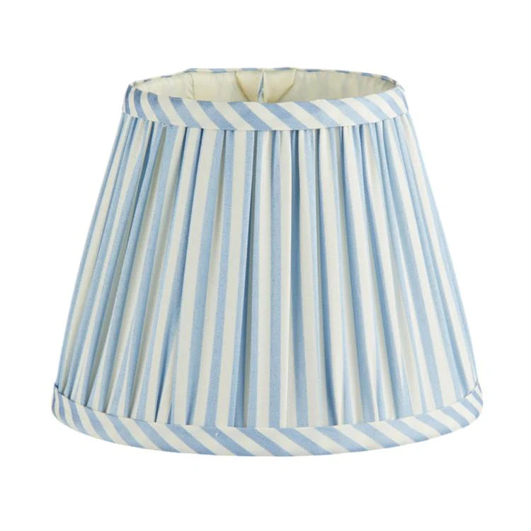 The Addison Ross Empire and Scalloped Lampshade features vertical blue and white stripes, a slightly flared shape, fabric edge trim, and fits an E14 bulb holder.