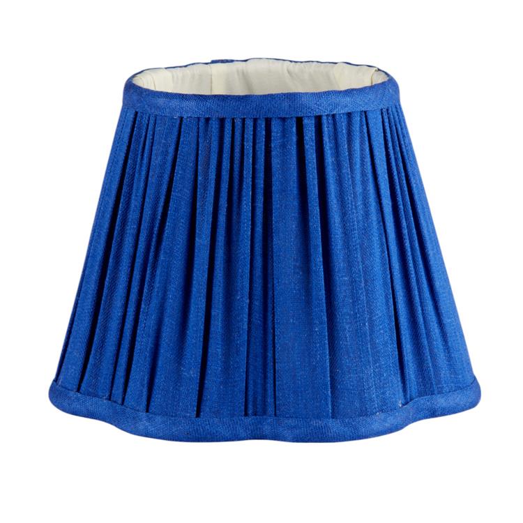 The Addison Ross Empire and Scalloped Lampshades feature a blue pleated design with a white interior, making them an elegant match for any rechargeable lamp base or E14 bulb holder.