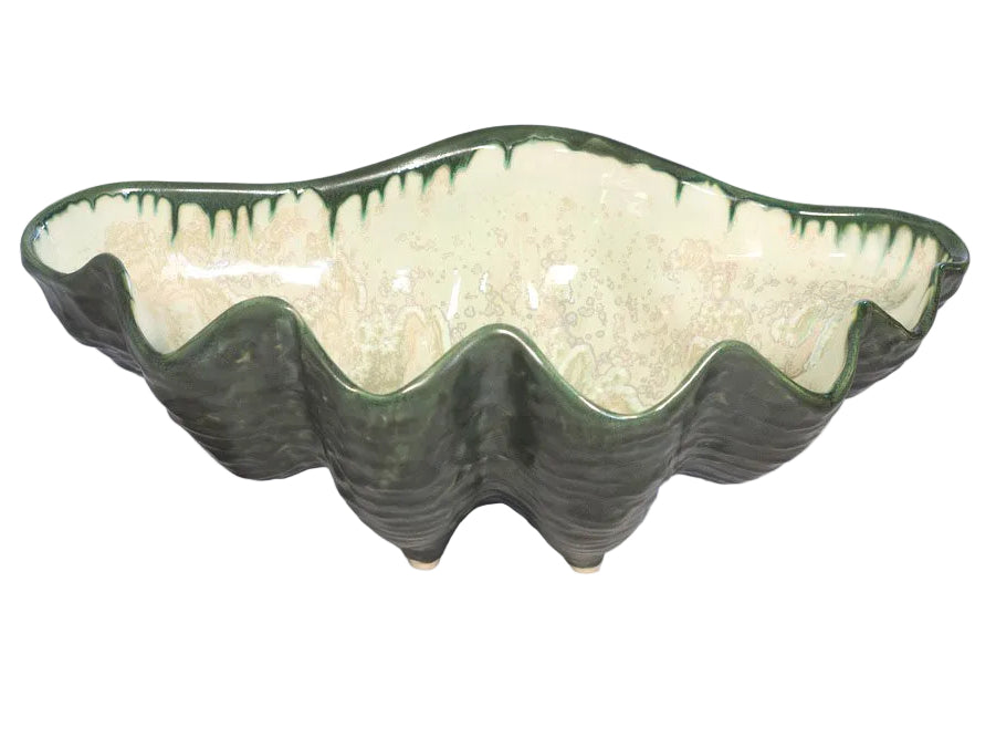 The Large Clam Bowl Collection by AE Ceramics features handcrafted ceramic bowls with a glossy green and cream glaze, perfect as unique serving platters for coastal dinnerware sets.