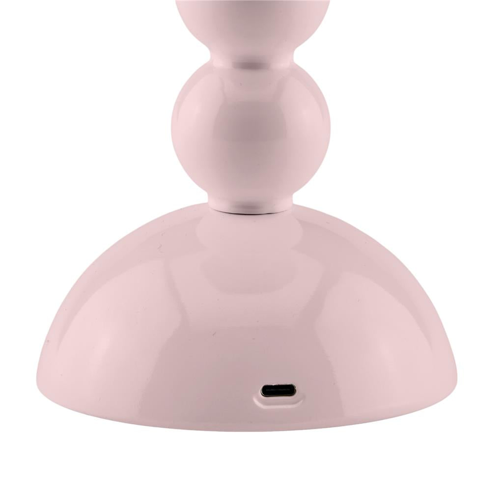 Close-up of the base of the Addison Ross Bobbin LED Cordless Lamp in pink, showing a USB-C charging port. This stylish portable lamp offers adjustable light levels to suit any mood.