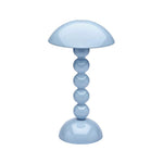 The Addison Ross Bobbin LED Cordless Lamp is a glossy light blue lamp with adjustable lighting, featuring a dome-shaped shade and a base of four stacked spheres, shown against a white background.