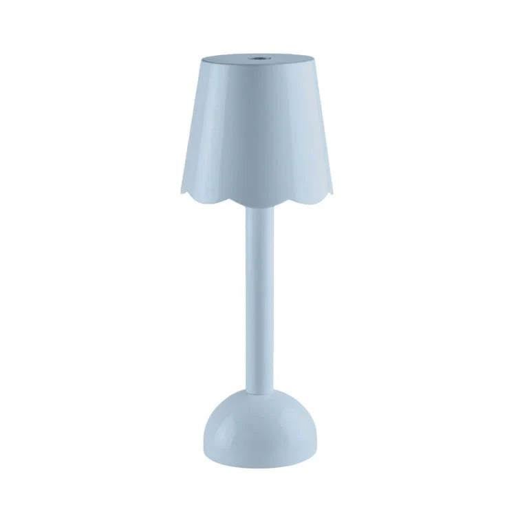 The Addison Ross Scallop LED Lamp is a modern, cordless bedside light featuring a scalloped-edge shade and round base, displayed against a plain white background.