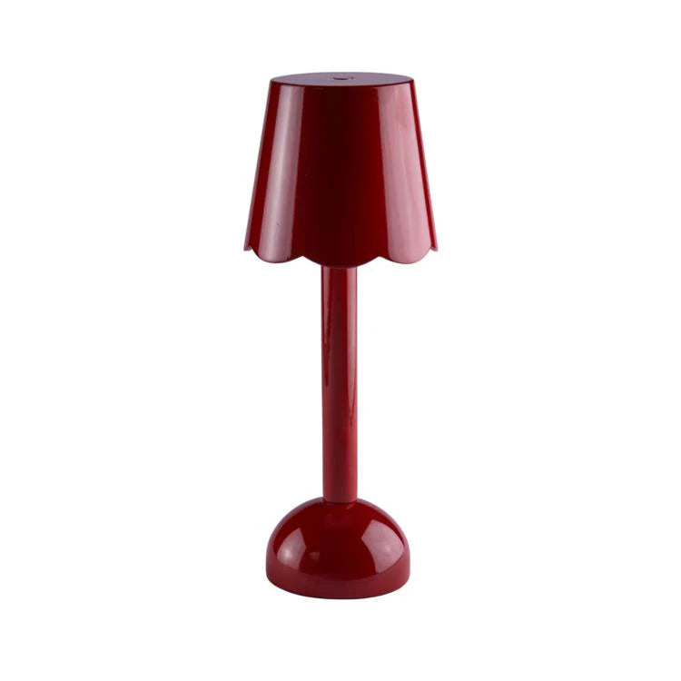The Addison Ross Scallop LED Lamp features a red scalloped lampshade, cylindrical stem, and round base, shown on a white background.