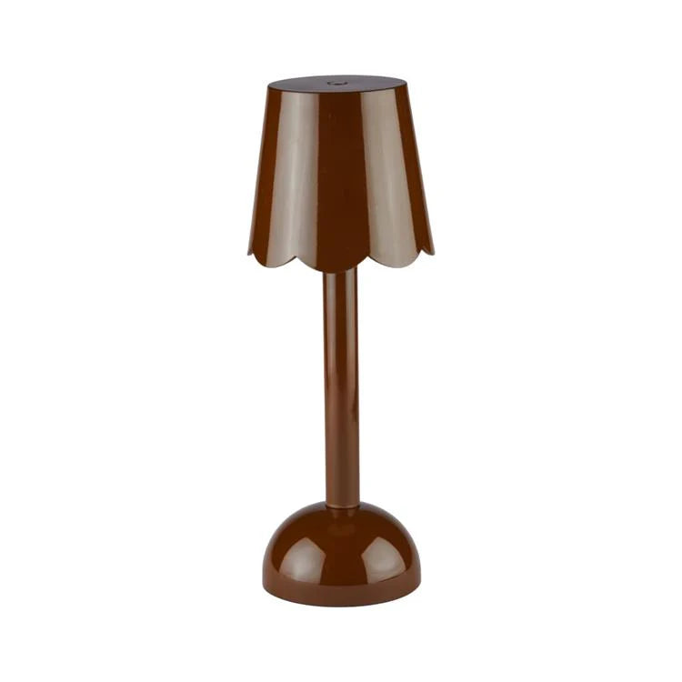 The Addison Ross Scallop LED Lamp is a brown portable table lamp with a scalloped shade, straight stem, and round base—ideal as a cordless bedside light for flexible, stylish lighting on any white background.