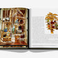 An open Assouline book, "From Louis to Vuitton," displays a photo of luxury handbags on a decorative palm tree on the left page, with text and an illustration of a similar palm tree display on the right.