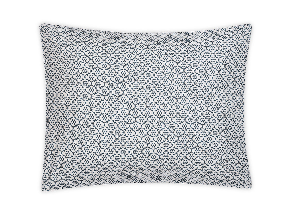 Part of the Matouk Laksha Bedding Collection, this rectangular pillow features a crisp white background adorned with a repeating blue geometric pattern inspired by traditional Indian block printing, displayed here against a plain white surface.