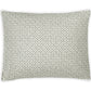 Rectangular pillow from the Matouk Laksha Bedding Collection, featuring a repeating small black and white geometric pattern on Luca percale fabric inspired by Indian block printing techniques, shown on a plain white background.