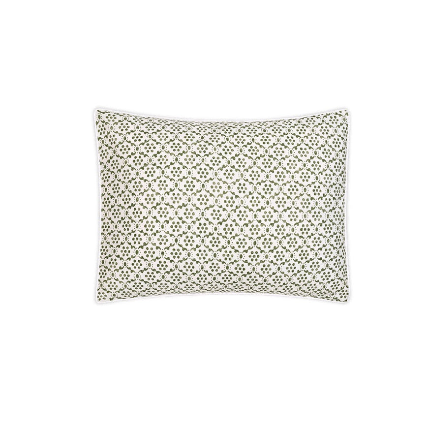 From the Laksha Bedding Collection by Matouk, this rectangular pillow features a white background adorned with a green geometric pattern inspired by traditional Indian block printing, shown against a plain white backdrop.