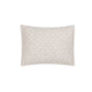 Rectangular pillow from the Matouk Laksha Bedding Collection, featuring a beige and white geometric lattice pattern inspired by traditional Indian block printing, viewed from above against a plain white background.