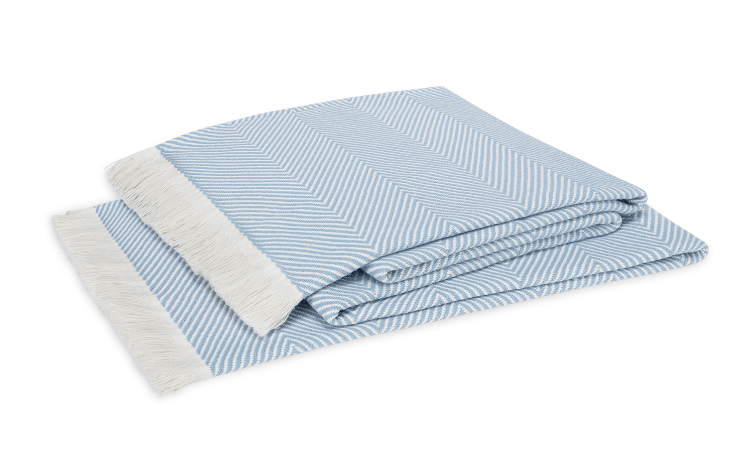 The Leo Throw by Matouk features an oversized blue and white herringbone design with a chevron pattern and white fringe on one edge, shown folded against a white background.