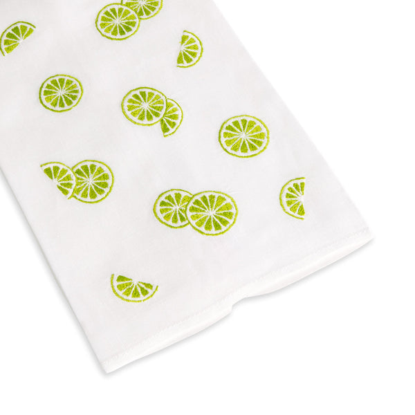 White kitchen towel, 100% linen, with a pattern of Lime Slice Tip Towel from Haute Home against a plain background.