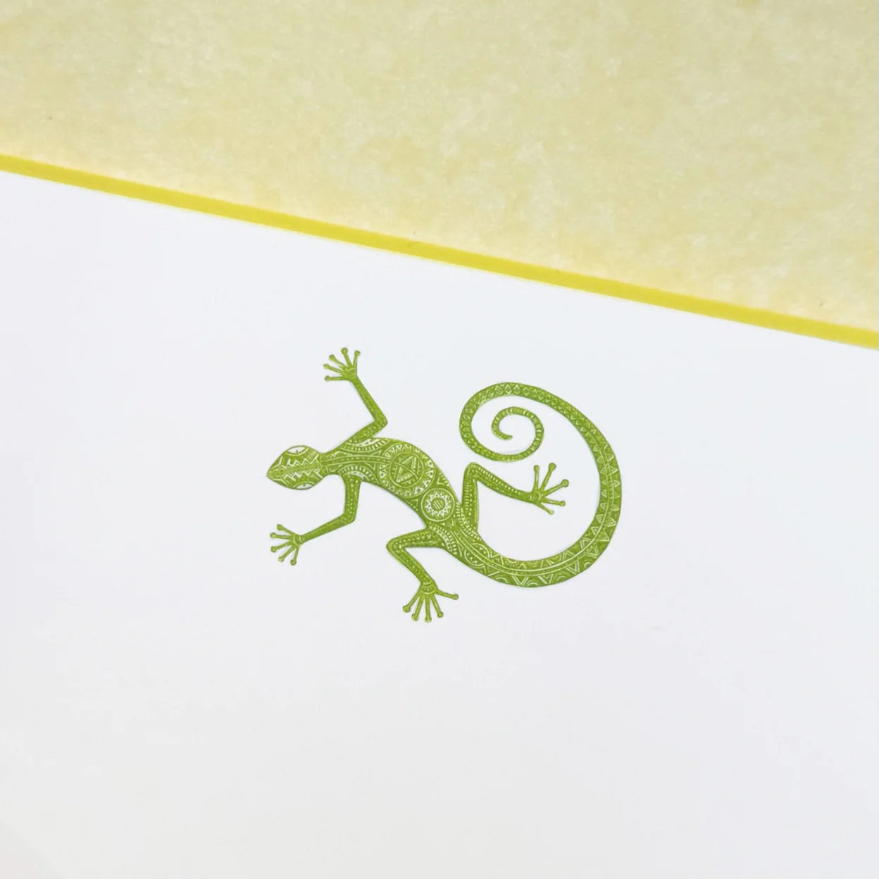 Printery's Lizard Note Cards feature a green, intricately patterned gecko illustration centered on a bone white card with a yellow top border—perfect for anyone who loves unique lizard-themed stationery.