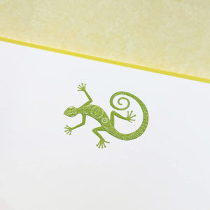 Printery's Lizard Note Cards feature a green, intricately patterned gecko illustration centered on a bone white card with a yellow top border—perfect for anyone who loves unique lizard-themed stationery.