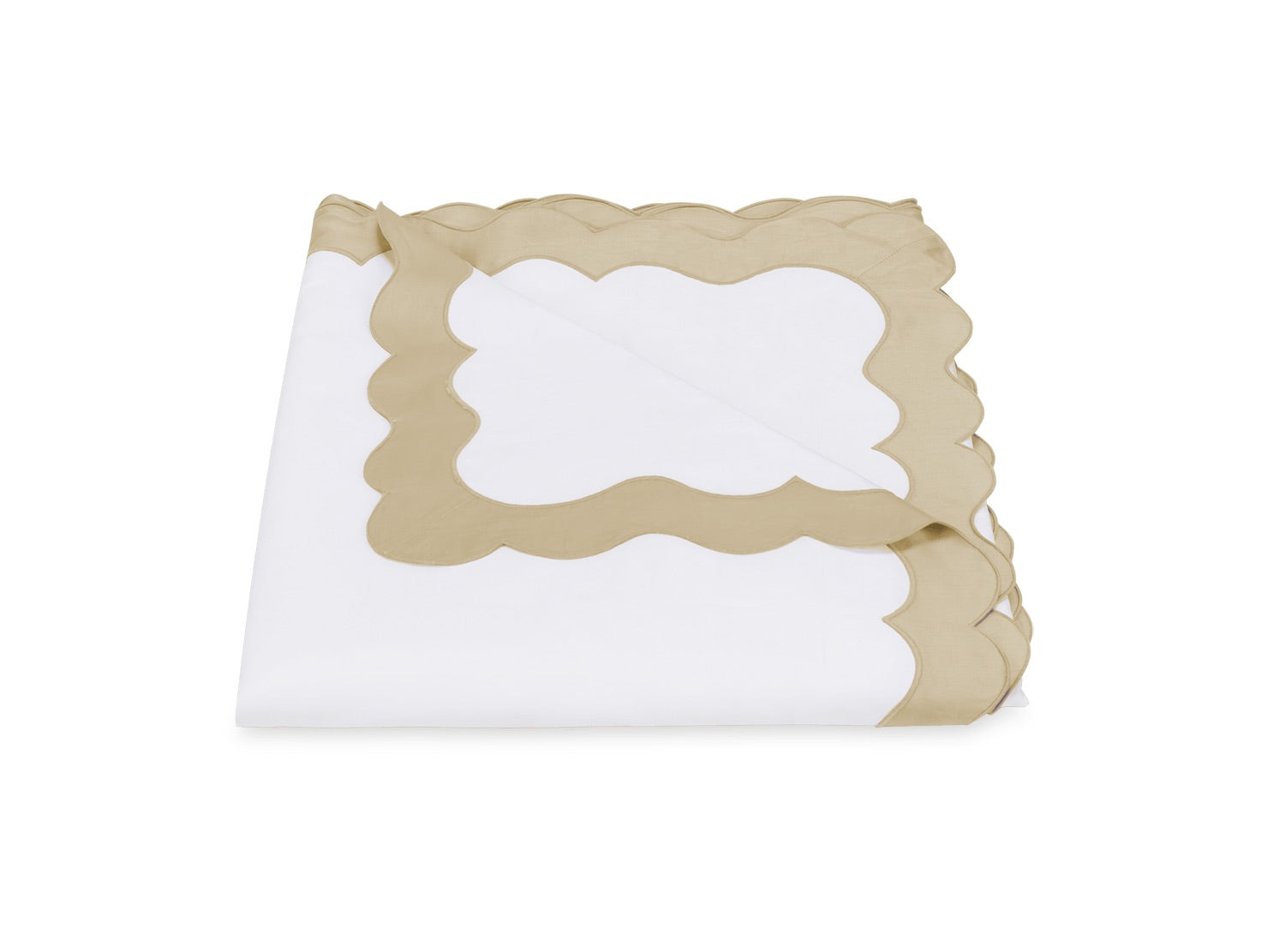Experience the Lorelei Bedding Collection by Matouk—an exquisitely folded white sheet made from luxurious 600 thread count Egyptian cotton, beautifully accented with an elegant light brown appliqué scallop along the border, displayed against a crisp white background.